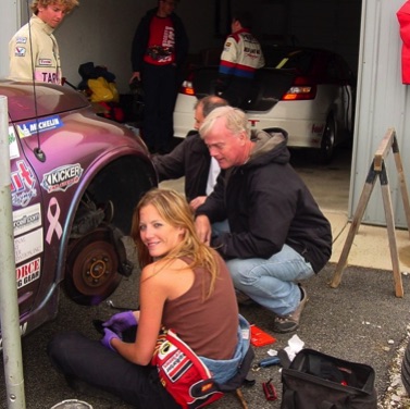 Amanda fixing a brake issue.